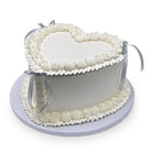 White and Silver Sweetheart Theme Cake Freed's Bakery 